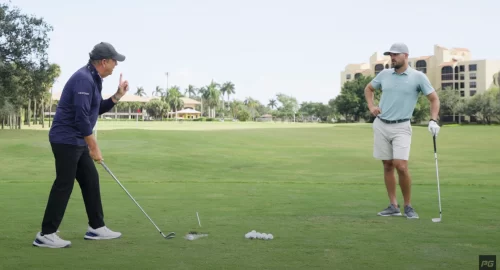 Two golfers talking to each other